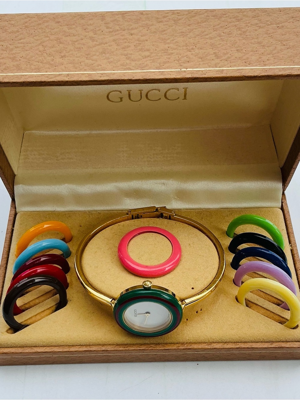 Gucci Gold Bangle Watch with beautiful bezels💛💙💚❤️💜🩵